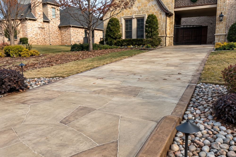 Decorative concrete driveway resurfacing in McKinney Texas