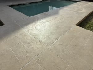 Decorative pool deck overlay resurfacing in Saginaw TX