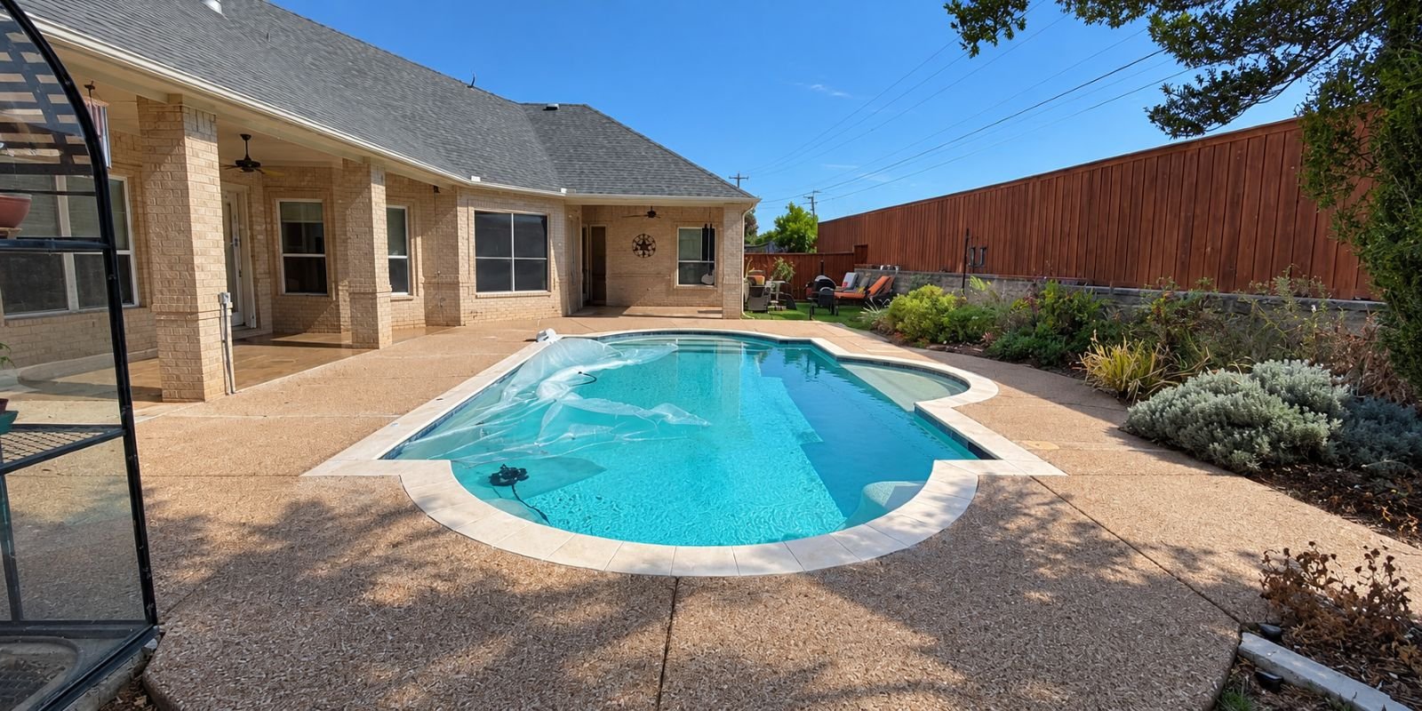 Before: original backyard pool patio before resurfacing